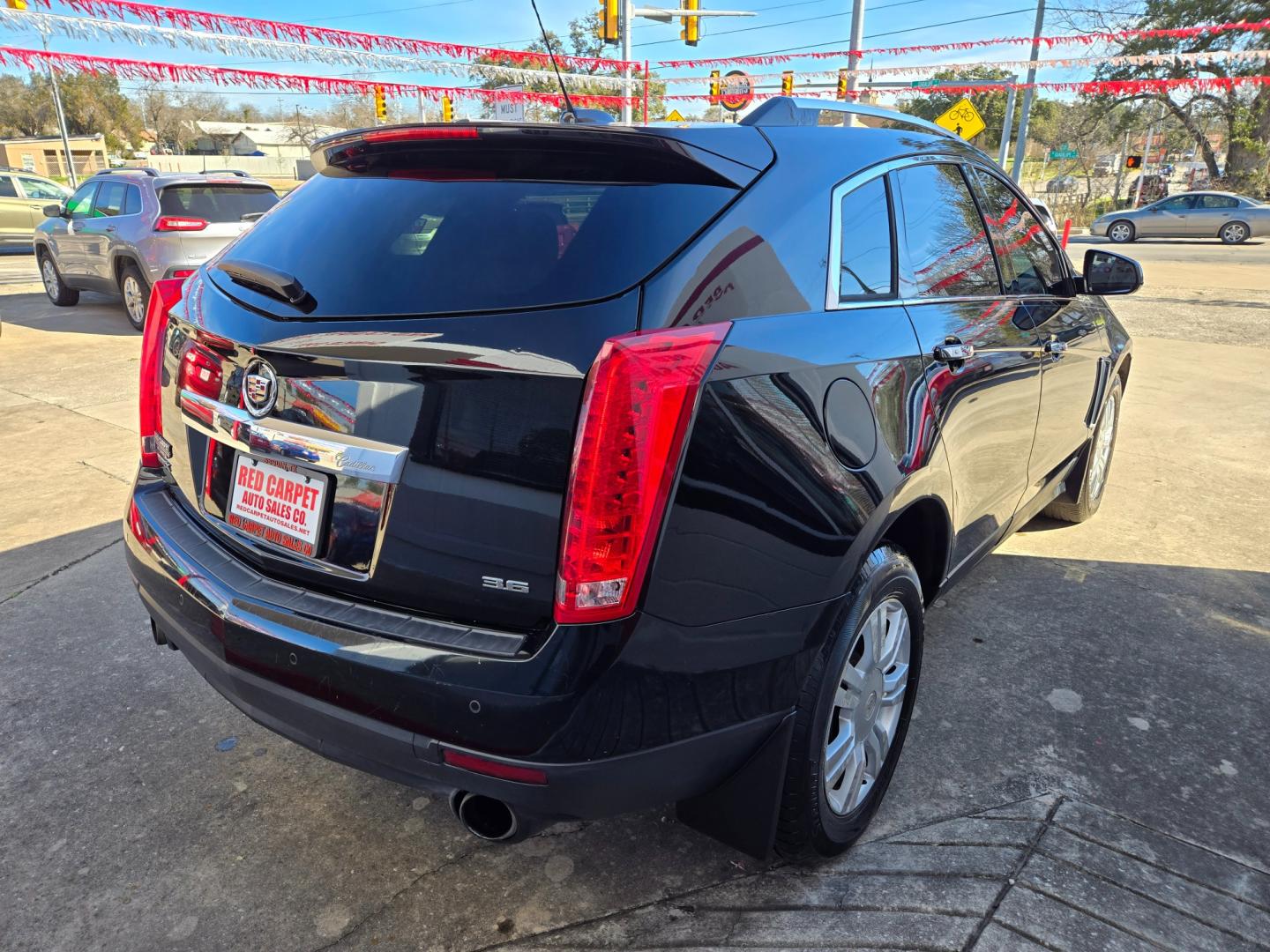 2015 BLACK Cadillac SRX (3GYFNBE37FS) with an 3.6L V6 F DOHC 24V engine, Automatic transmission, located at 503 West Court, Seguin, TX, 78155, (830) 379-3373, 29.568621, -97.969803 - Photo#2